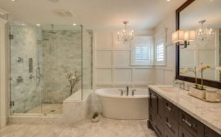 Marble bathroom with white wall and oval bathtub Marble bathroom with white wall and oval bathtub